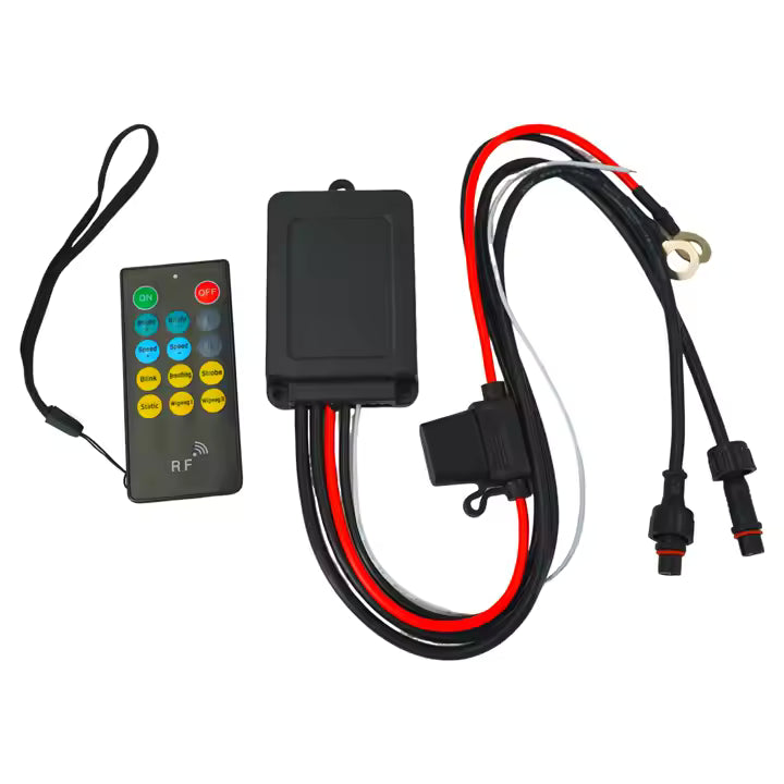 Car remote control kit with wireless receiver and wiring harness on a white background
